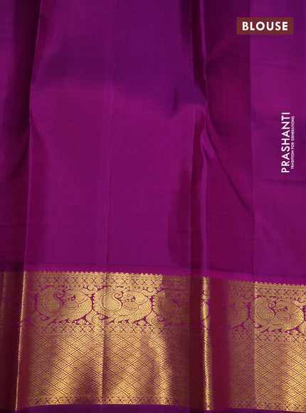 Pure kanchipuram silk saree teal blue and purple with zari woven buttas and annam zari woven korvai border