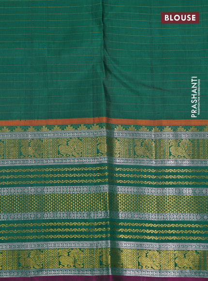 Pure kanchipuram silk saree blue and green with allover zari checked pattern and long zari woven border