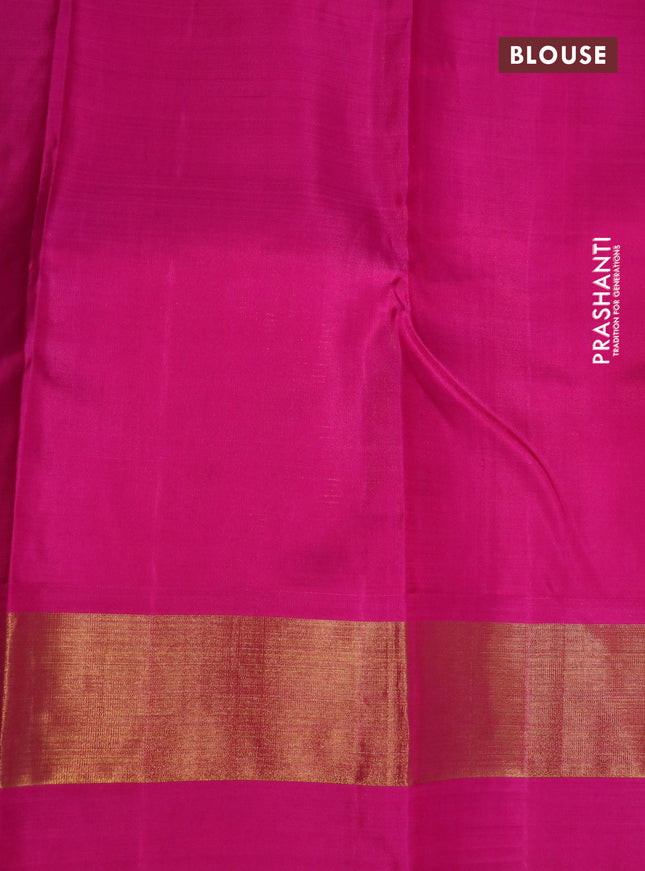 Pure kanchipuram silk saree green and pink with plain body and teample design zari woven border
