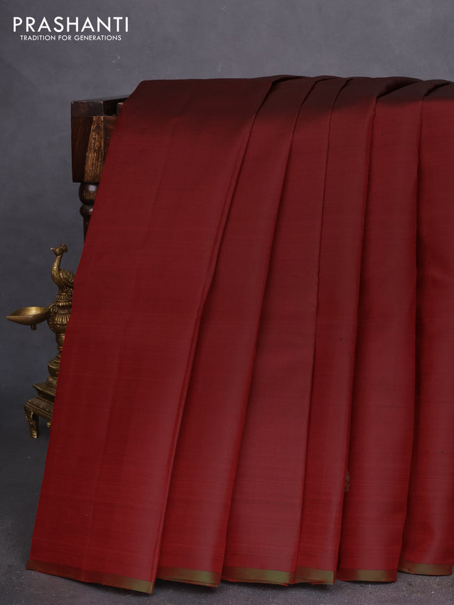 Pure kanchipuram silk saree maroon and dual shade of green with zari woven buttas and piping border