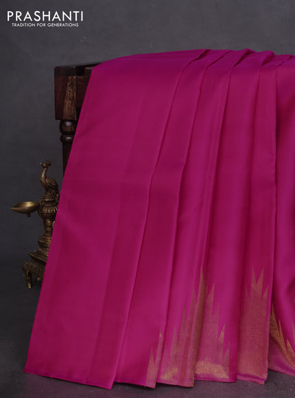 Pure kanchipuram silk saree dual shade of pink with plain body and temple design zari woven border