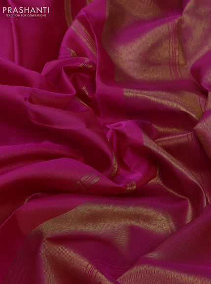 Pure kanchipuram silk saree dual shade of pink with plain body and temple design zari woven border