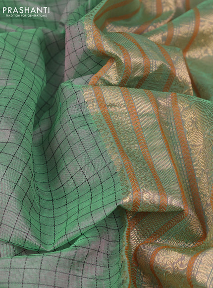 Kanchipuram silk cotton saree dual shade of green with allover thread woven checked pattern and zari woven border
