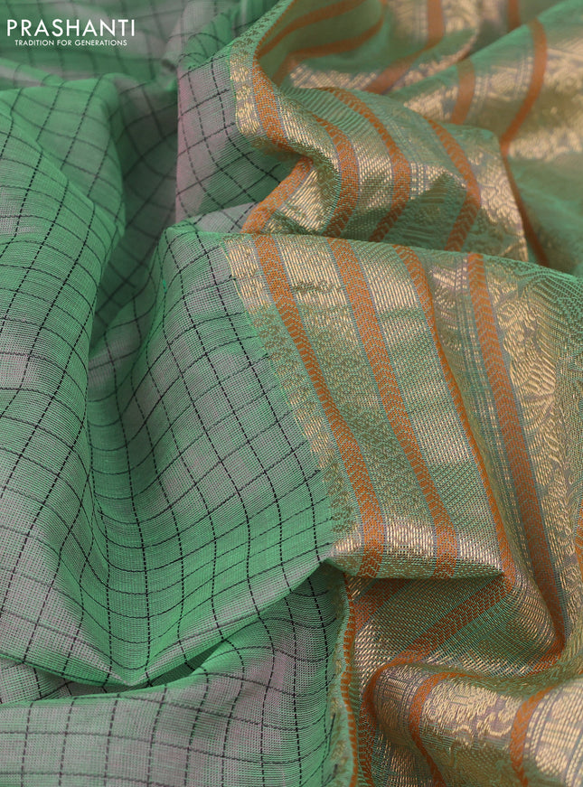 Kanchipuram silk cotton saree dual shade of green with allover thread woven checked pattern and zari woven border