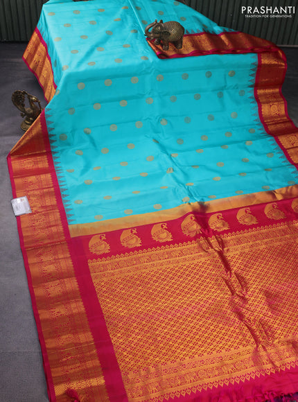 Pure gadwal silk saree teal shade and pink with zari woven buttas and long temple design zari woven border