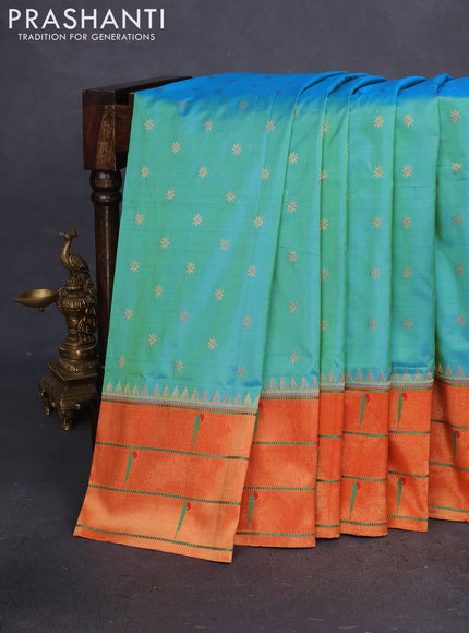 Pure paithani silk saree dual shade of teal green and red with allover zari woven floral buttas and zari woven muniya butta border