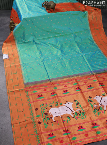 Pure paithani silk saree dual shade of teal green and red with allover zari woven floral buttas and zari woven muniya butta border