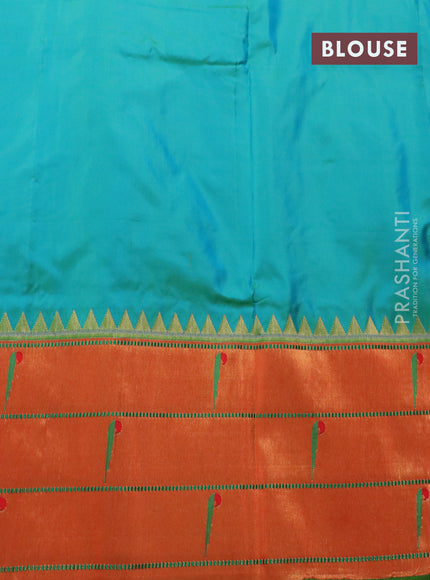 Pure paithani silk saree dual shade of teal bluish green and orange with zari woven buttas and zari woven muniya butta style border