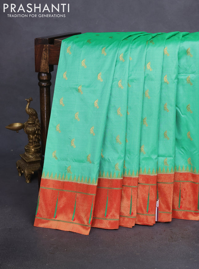 Pure paithani silk saree teal green shade and red with zari woven peacock buttas and zari woven muniya butta border