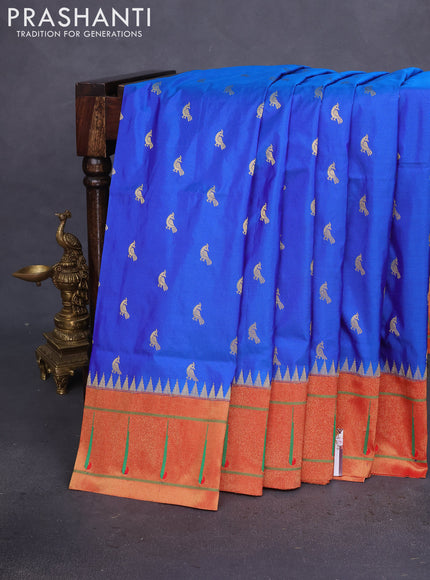 Pure paithani silk saree dual shade of blue and red with zari woven peacock buttas and zari woven muniya butta border