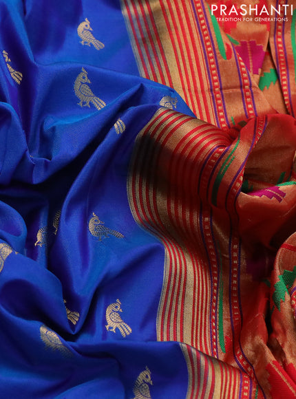 Pure paithani silk saree dual shade of blue and red with zari woven peacock buttas and zari woven muniya butta border