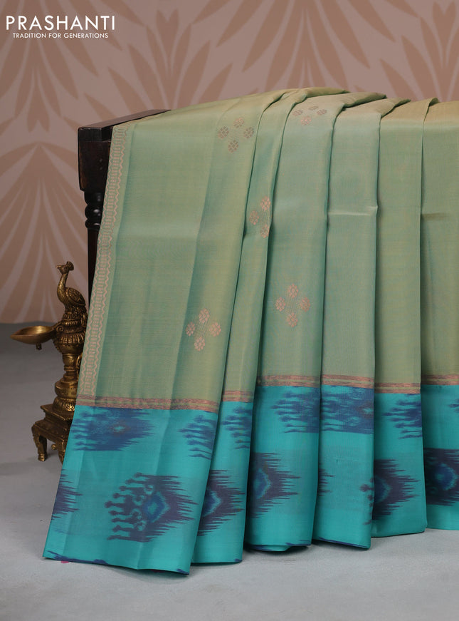 Kanchipuram soft silk saree dual shade of green and teal blue with copper zari weaves & buttas and copper zari woven ikat style border