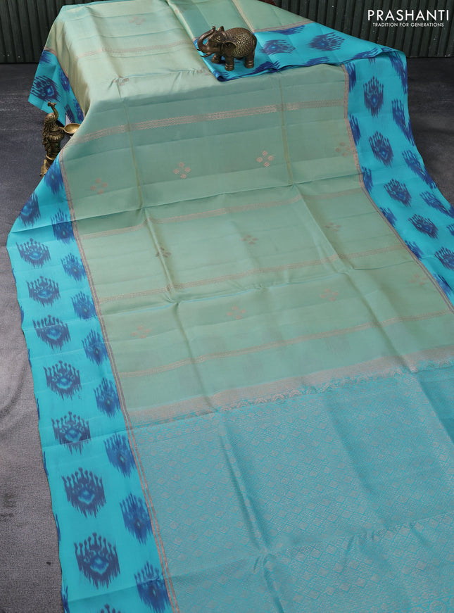 Kanchipuram soft silk saree dual shade of green and teal blue with copper zari weaves & buttas and copper zari woven ikat style border