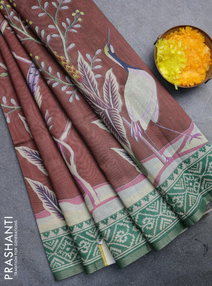 Semi tussar saree rust shade and green with allover prints and printed zari border