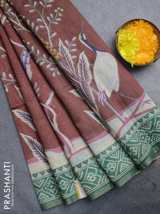 Semi tussar saree rust shade and green with allover prints and printed zari border