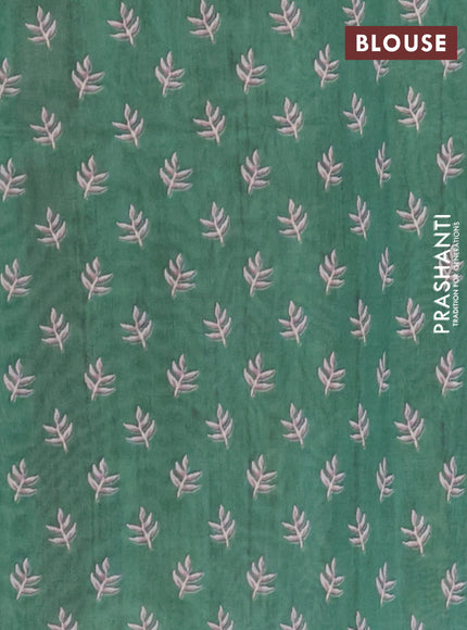 Semi tussar saree rust shade and green with allover prints and printed zari border