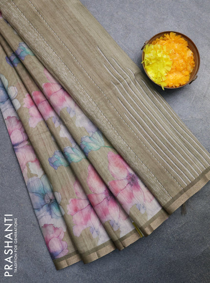 Semi tussar saree elaichi green and green with allover floral prints and small zari woven border