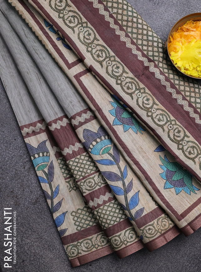 Semi tussar saree grey shade and brown with plain body and long printed zari border