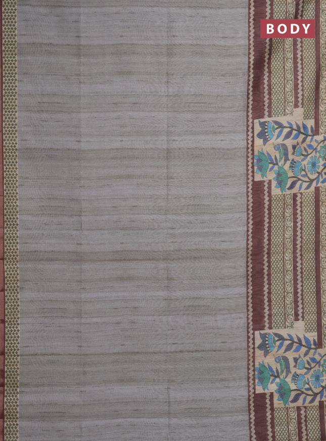 Semi tussar saree grey shade and brown with plain body and long printed zari border