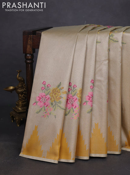 Tissue saree mustard yellow with embroidery work buttas and temple design zari border