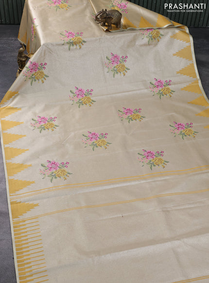 Tissue saree mustard yellow with embroidery work buttas and temple design zari border