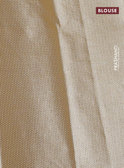 Tissue saree mustard yellow with embroidery work buttas and temple design zari border