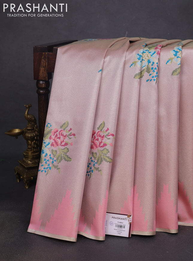 Tissue saree pastel pink with embroidery work buttas and temple design zari border