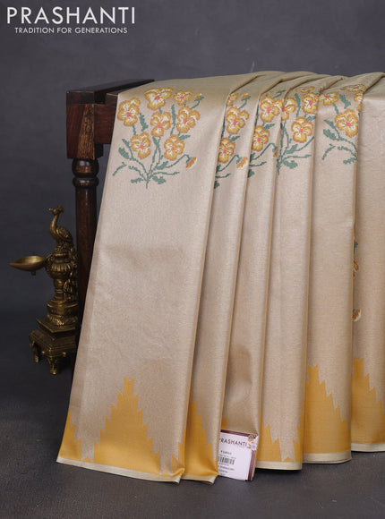 Tissue saree mustard yellow with embroidery work buttas and temple design zari border
