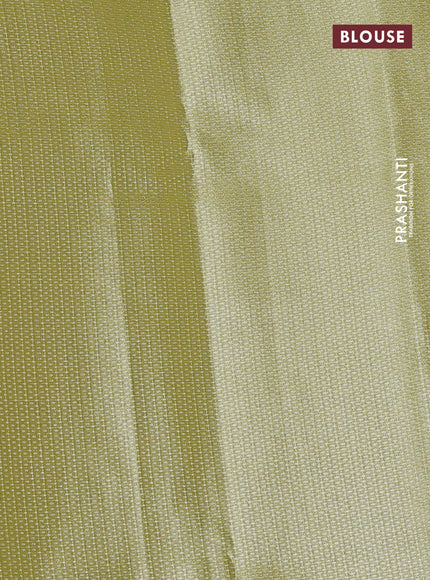 Tissue saree lime yellow with embroidery work buttas and temple design zari border