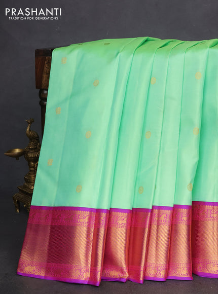 Pure kanchipuram silk saree teal green shade with zari woven buttas and ganga jamuna border