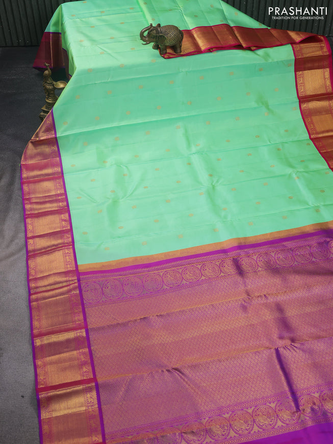 Pure kanchipuram silk saree teal green shade with zari woven buttas and ganga jamuna border