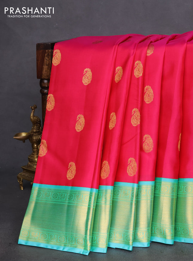 Pure kanchipuram silk saree pink and teal shade with zari woven paisley buttas and zari woven border