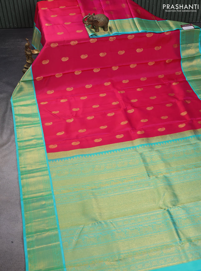 Pure kanchipuram silk saree pink and teal shade with zari woven paisley buttas and zari woven border