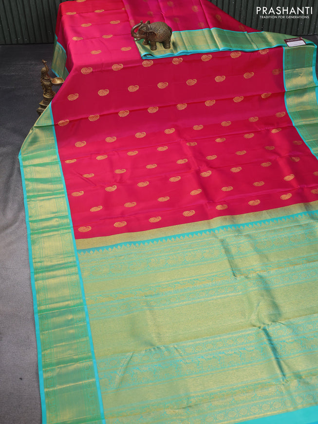 Pure kanchipuram silk saree pink and teal shade with zari woven paisley buttas and zari woven border