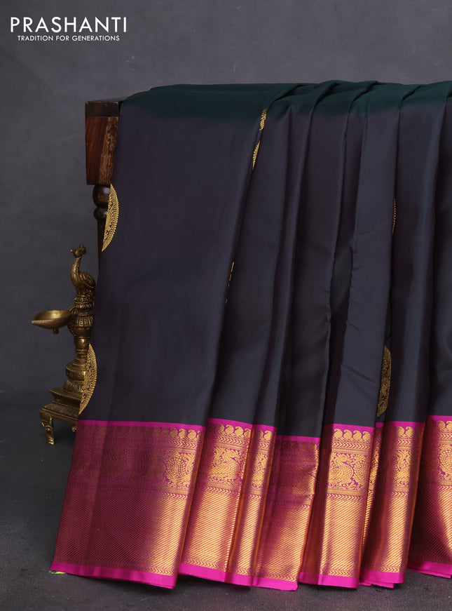 Pure kanchipuram silk saree bottle green and magenta pink with zari woven paisley buttas and zari woven annam border