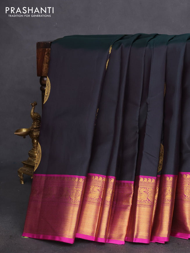 Pure kanchipuram silk saree bottle green and magenta pink with zari woven paisley buttas and zari woven annam border