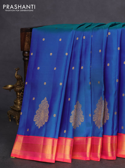 Pure kanchipuram silk saree dual shade of bluish green and dual shade of pink with allover zari woven buttas and zari woven border