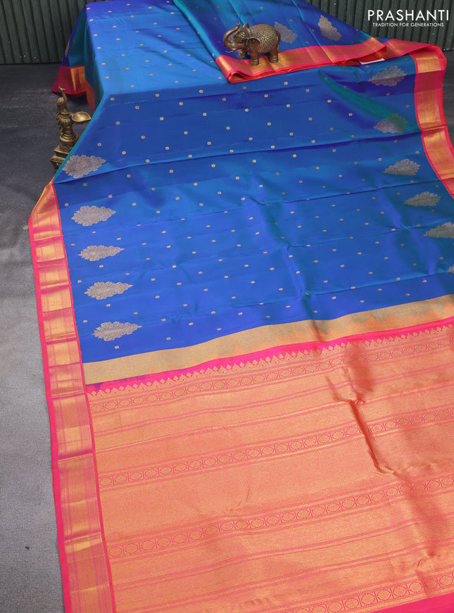 Pure kanchipuram silk saree dual shade of bluish green and dual shade of pink with allover zari woven buttas and zari woven border