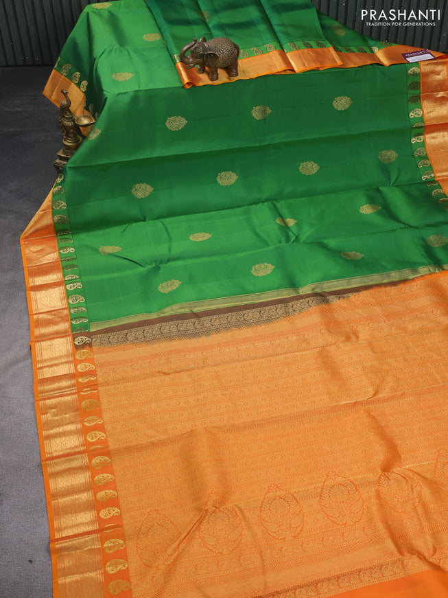 Pure kanchipuram silk saree green and orange shade with zari woven buttas and paisley design zari woven border