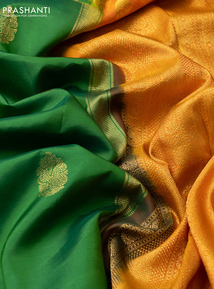 Pure kanchipuram silk saree green and orange shade with zari woven buttas and paisley design zari woven border