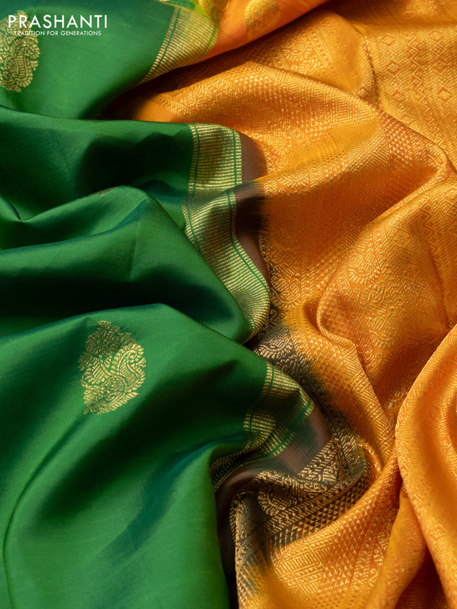 Pure kanchipuram silk saree green and orange shade with zari woven buttas and paisley design zari woven border