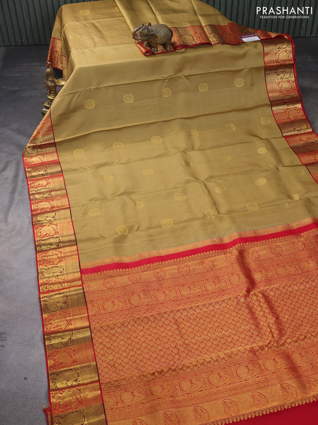 Pure kanchipuram silk saree drak sandal and maroon red with zari woven buttas and zari woven border