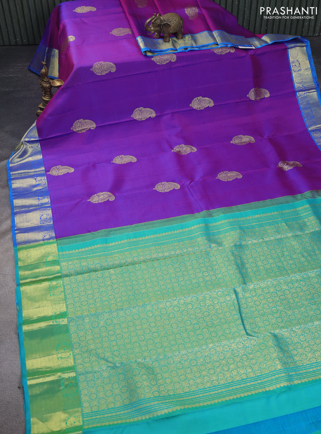 Pure kanchipuram silk saree dual shade of purple and dual shade of teal with zari woven buttas and zari woven border