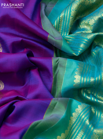 Pure kanchipuram silk saree dual shade of purple and dual shade of teal with zari woven buttas and zari woven border