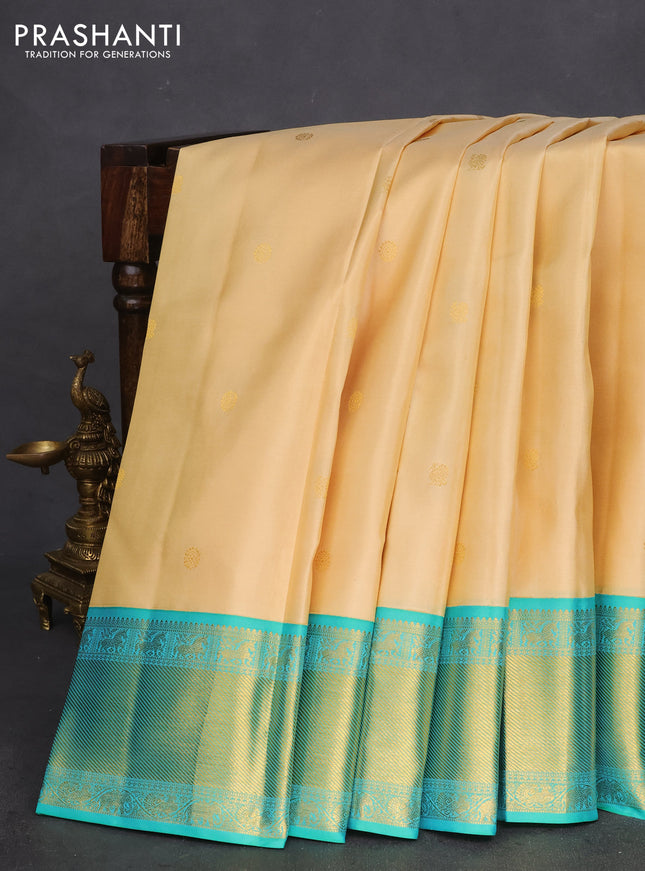 Pure kanchipuram silk saree cream with zari woven buttas and ganga jamuna border
