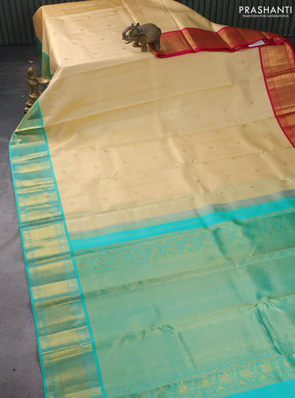 Pure kanchipuram silk saree cream with zari woven buttas and ganga jamuna border