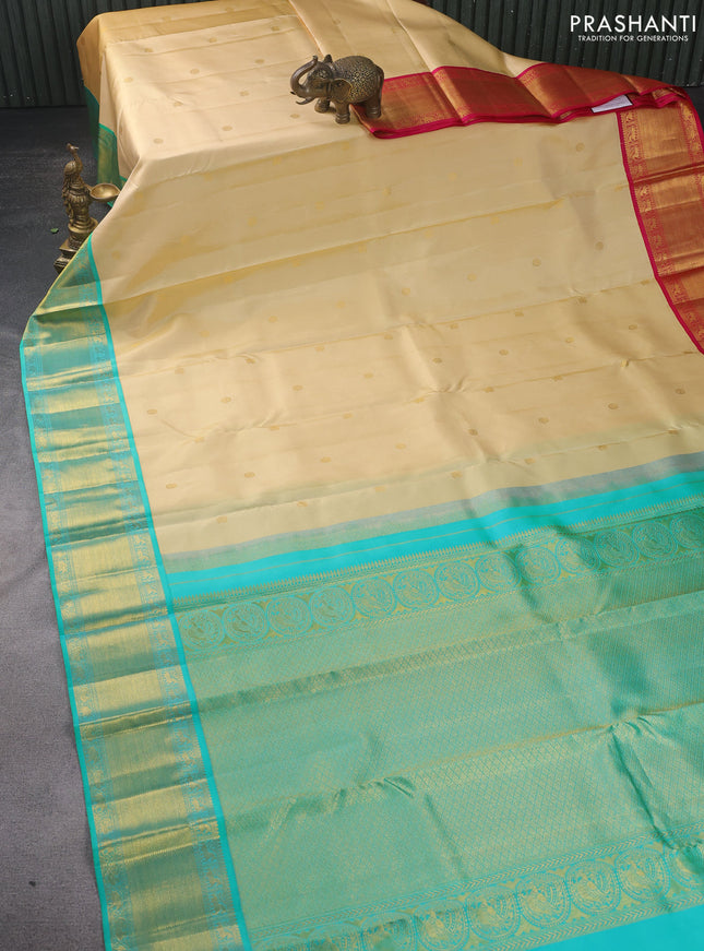 Pure kanchipuram silk saree cream with zari woven buttas and ganga jamuna border