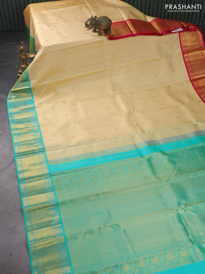 Pure kanchipuram silk saree cream with zari woven buttas and ganga jamuna border