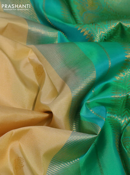 Pure kanchipuram silk saree cream with zari woven buttas and ganga jamuna border
