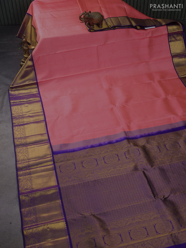 Pure kanchipuram silk saree peach pink and blue with allover zari butta weaves and zari woven korvai border